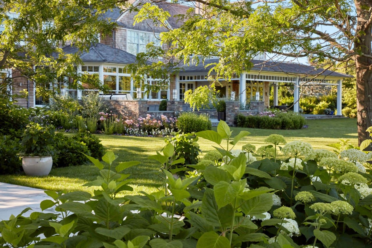 Shingle-style estate viewed from the back garden